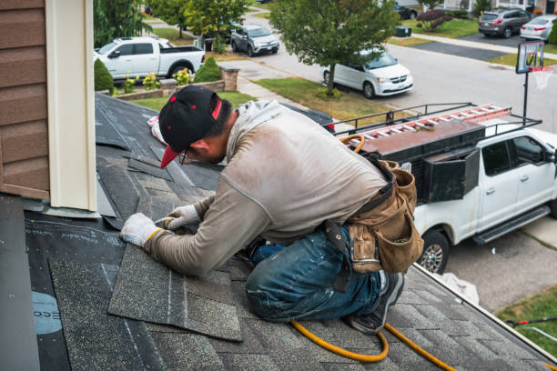 Professional Roofing technician working in Riley, IN